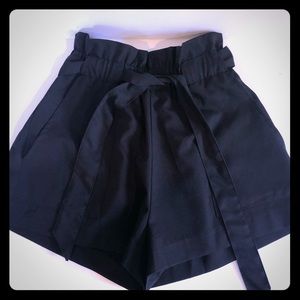 High waisted black tie front shorts